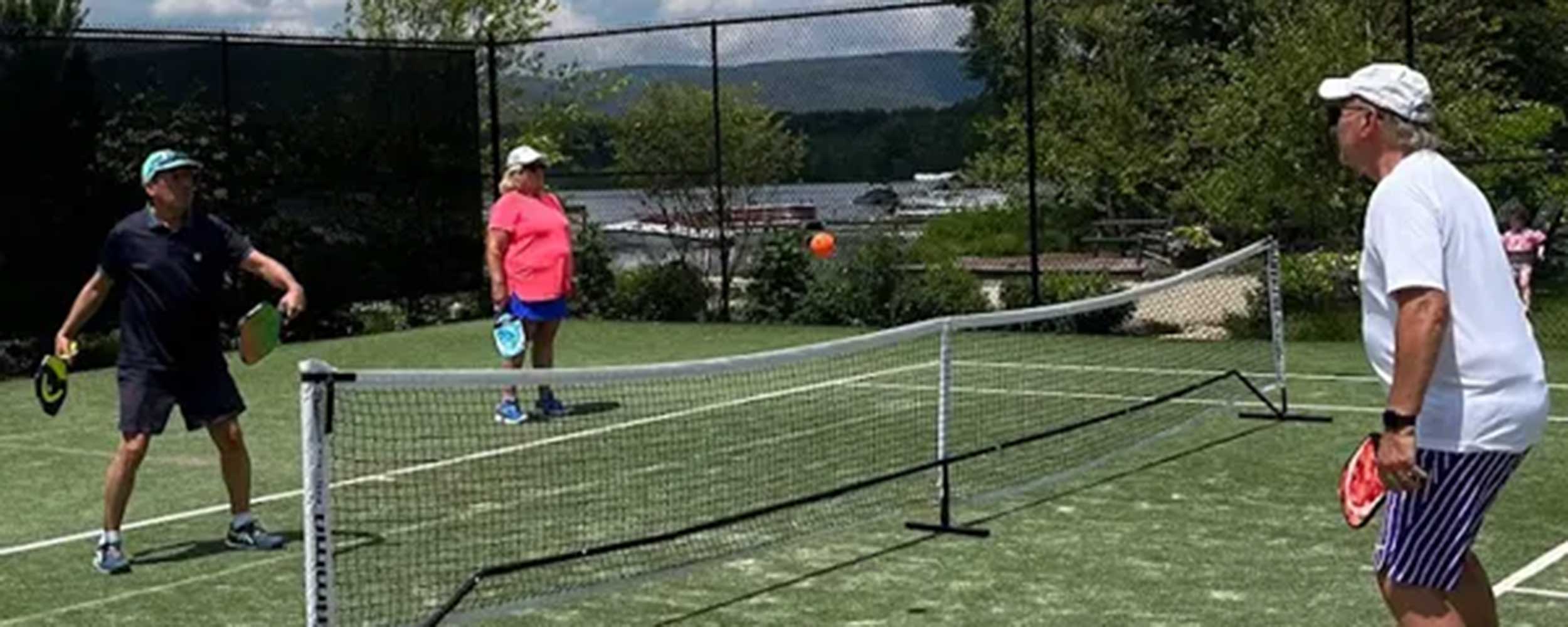 tennis2 Members playing doubles on the club courts